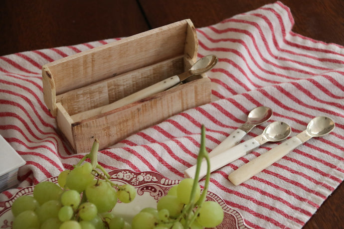 Alpaca spoons, wooden box, grapes, striped red fabric, grapes